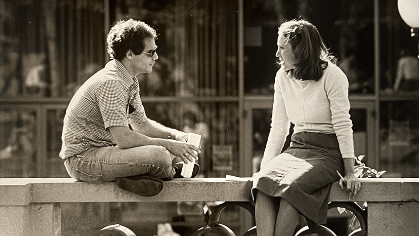 Students interacting outside in the 1980s