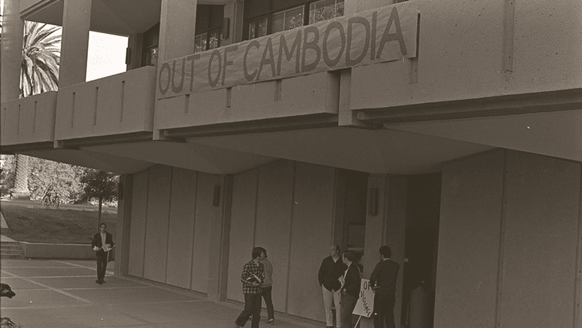 Building with sign that says "Out of Cambodia"